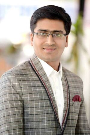 Dr. Ambar Pare